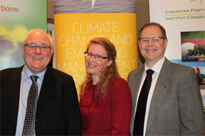 Clyde Graham, CFI, Susan Wood-Bohm, CCEMC, and Doug Cornell, Alberta Wheat announce phase II of project to help farmers reduce greenhouse gas emissions.